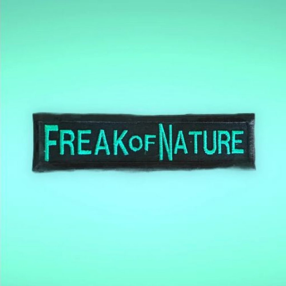 Freak of Nature Embroidered Emblem/Patch black border green lettering NWT